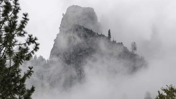 Rocks shrouded in low cloud